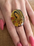 Elegant sterling silver ring featuring Virgin Mary sacred design